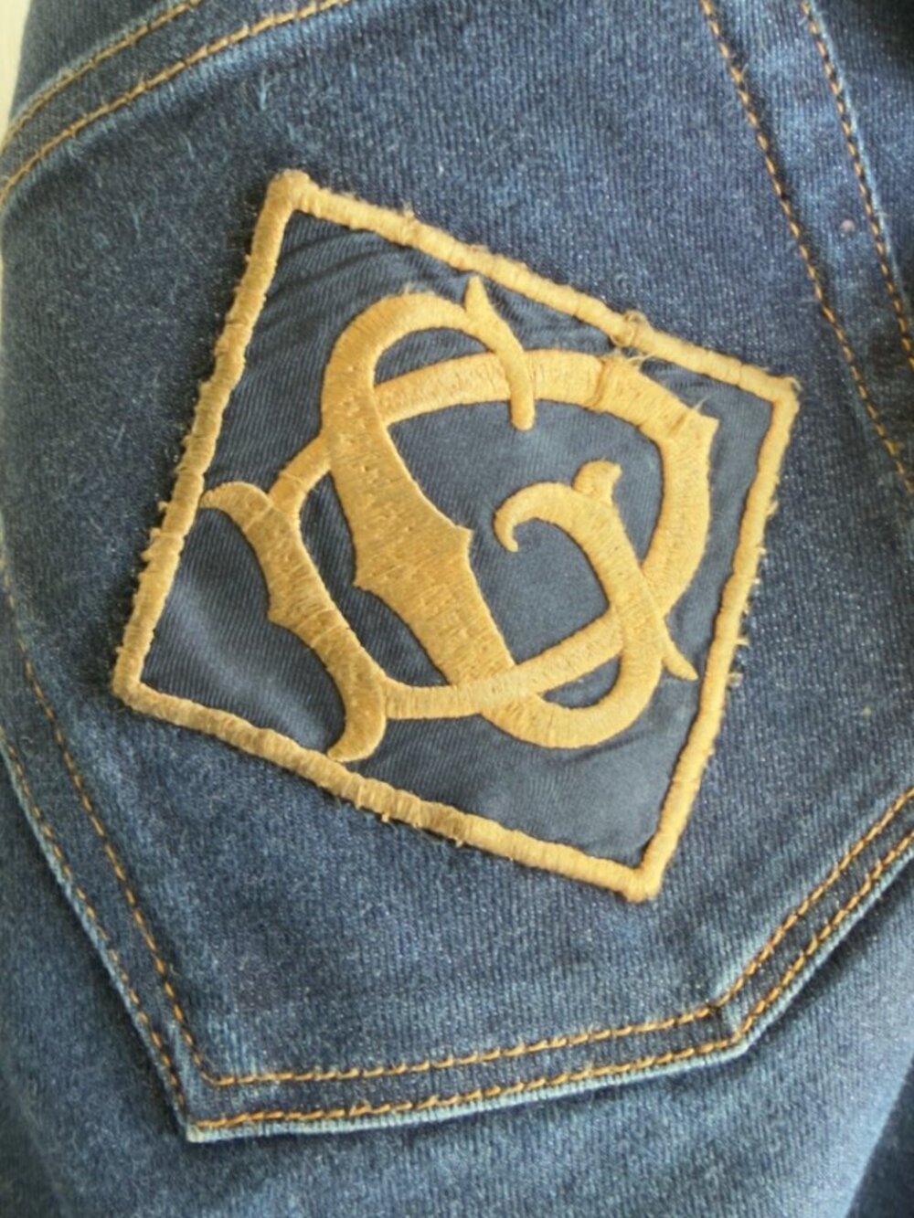 Dolce & Gabbana Men's Skinny Jeans in Blue with Gold Logo Patch